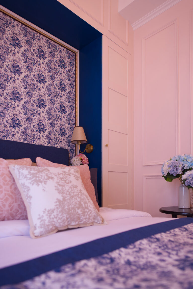 Detail of bed in chambre secrete showing alcove and wardrobes on each side of the bed