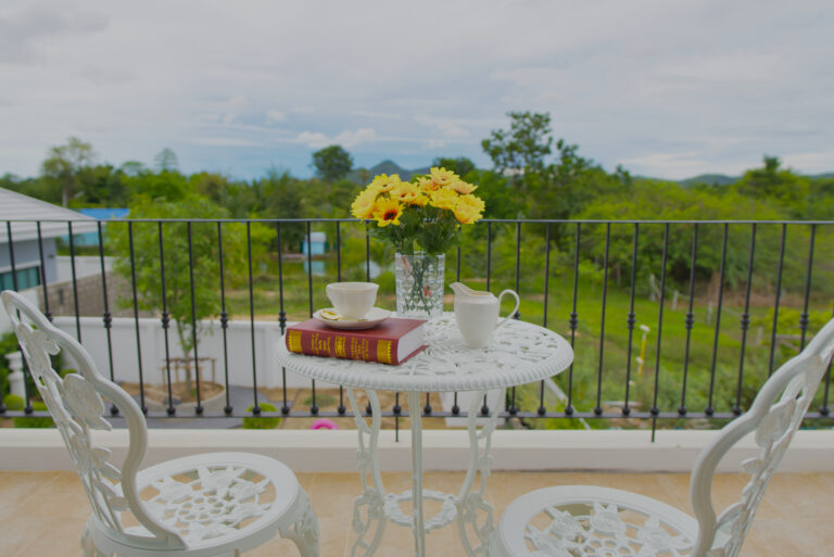 Terrace of chambre Soleil with garden and mountain views