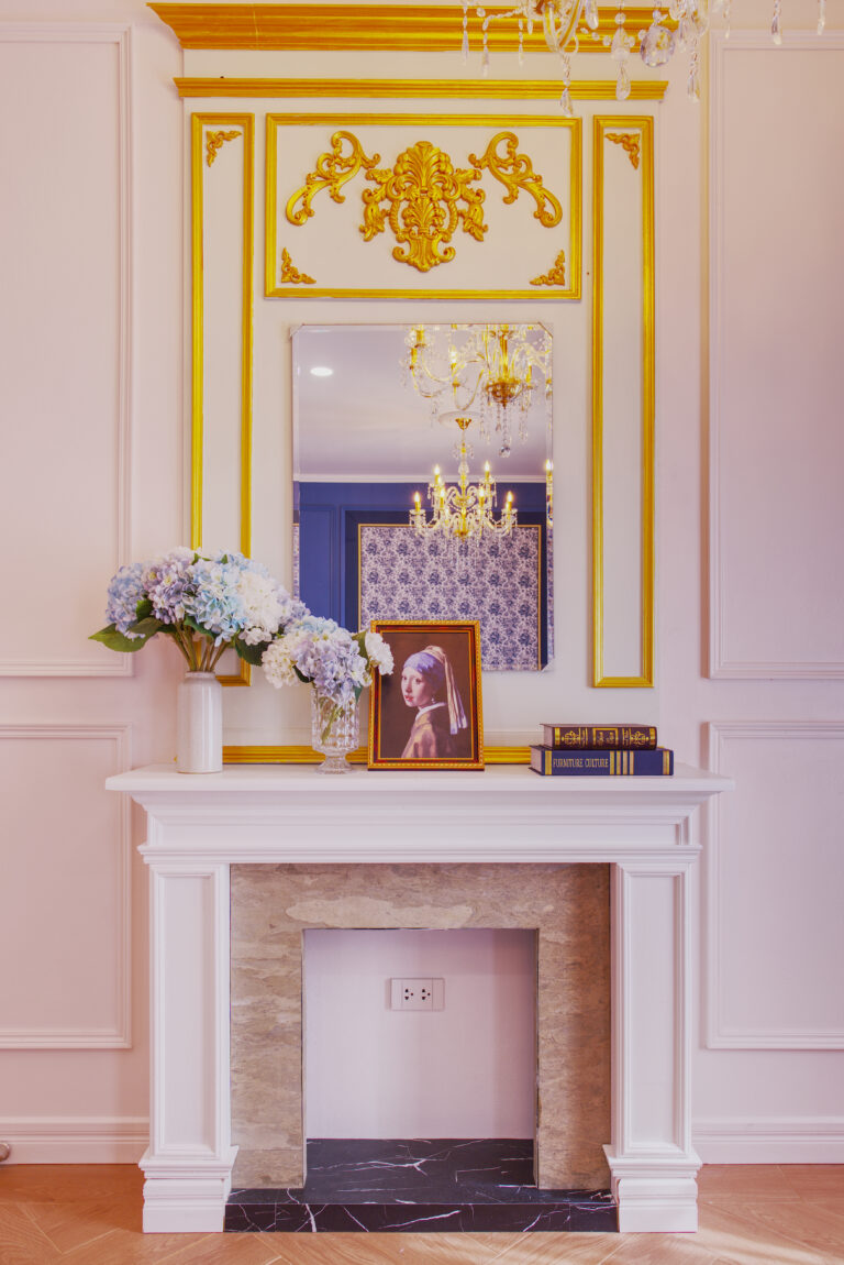 Decorate fireplace details with flowers and pictures