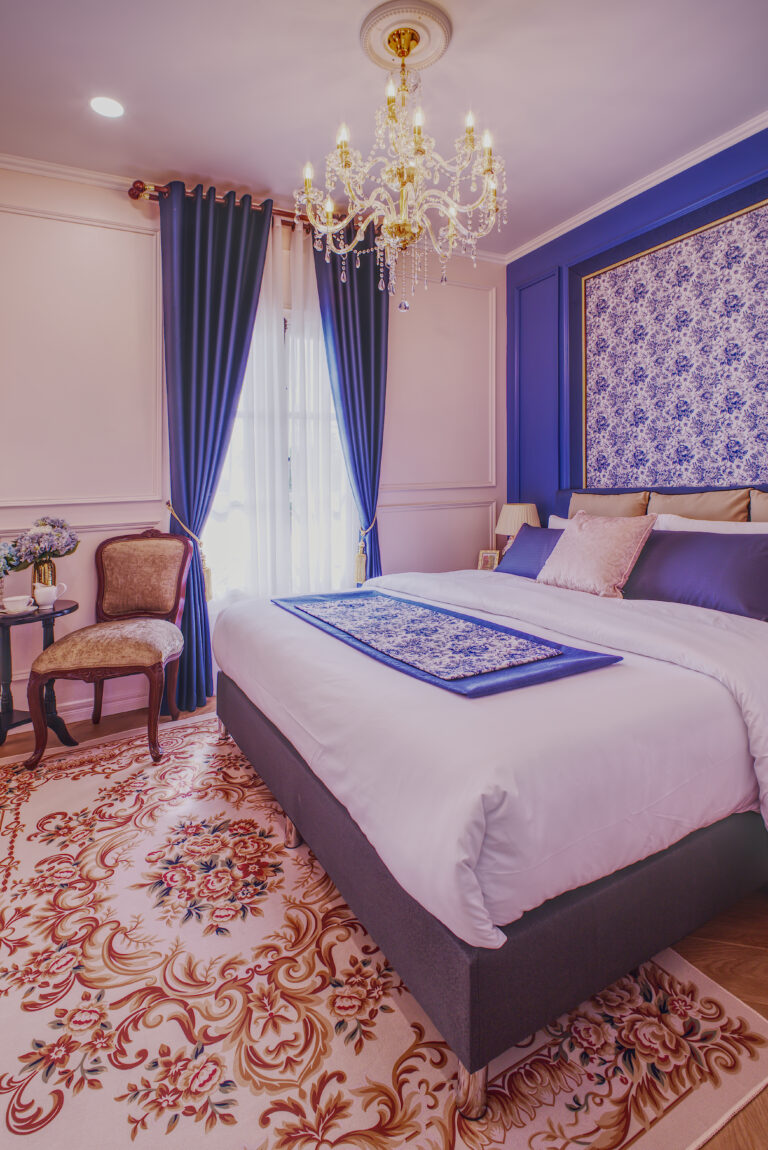 View from bathroom of chambre supreme towards bed and window